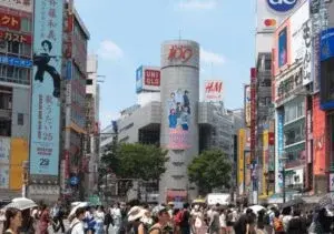 Crowded street view of the Shibuya 109 building in Tokyo